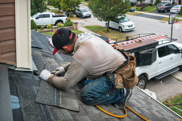 Professional Roofing technician working in Warnock, OH